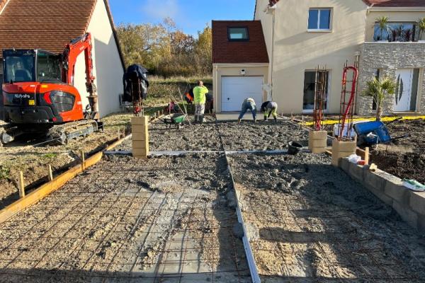 TRAVAUX DE TERRASSEMENT ET CREATION DALLE BETON DESACTIVE